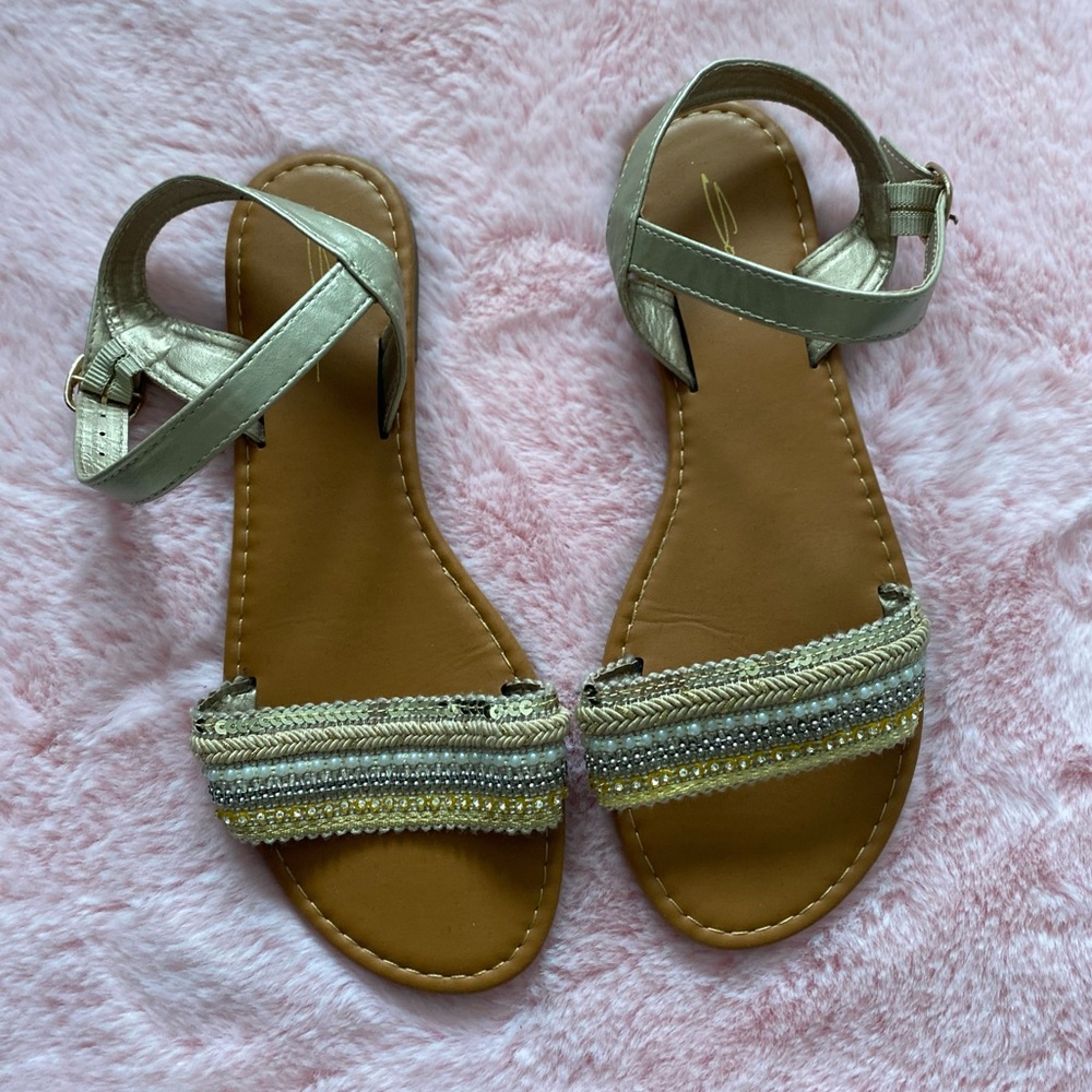 Gold and cream sandals with pearls